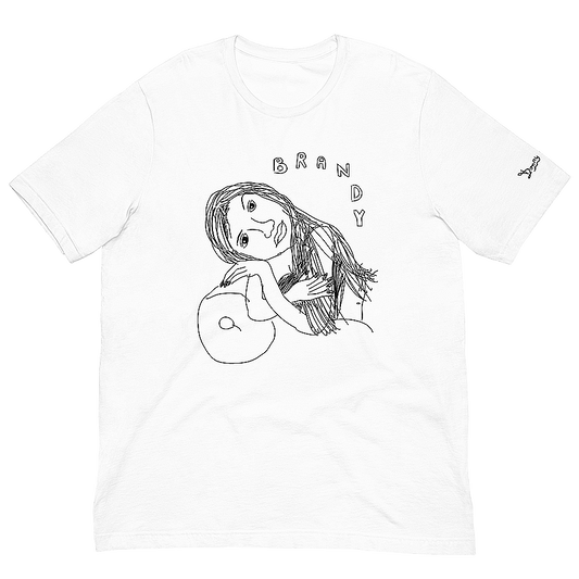 A white t-shirt featuring a nostalgic childhood-style bitmap drawing of American singer Brandy Norwood in black. Brandy is depicted reclining on a couch amidst graphic stars and a moon, with handwritten blocky bubble letters above her head spelling 'BRANDY.' © Donny Meloche, 2023.