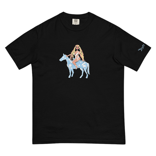 A crafty, colourful, and graphic portrait of singer Beyonce Knowles sitting on top of a baby blue horse covered in white stars and shapes - recreating her 2022 “Renaissance” album cover, printed on a black t-shirt.