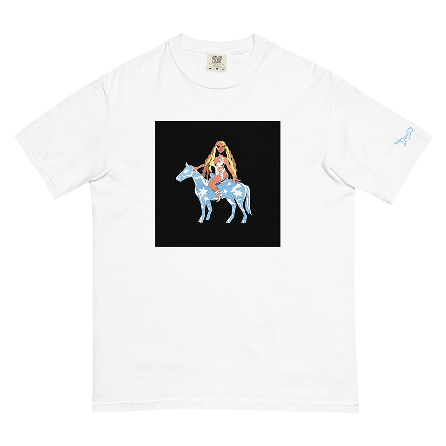 A crafty, colourful, and graphic portrait of singer Beyonce Knowles sitting on top of a baby blue horse covered in white stars and shapes - recreating her 2022 “Renaissance” album cover, printed on a white t-shirt.