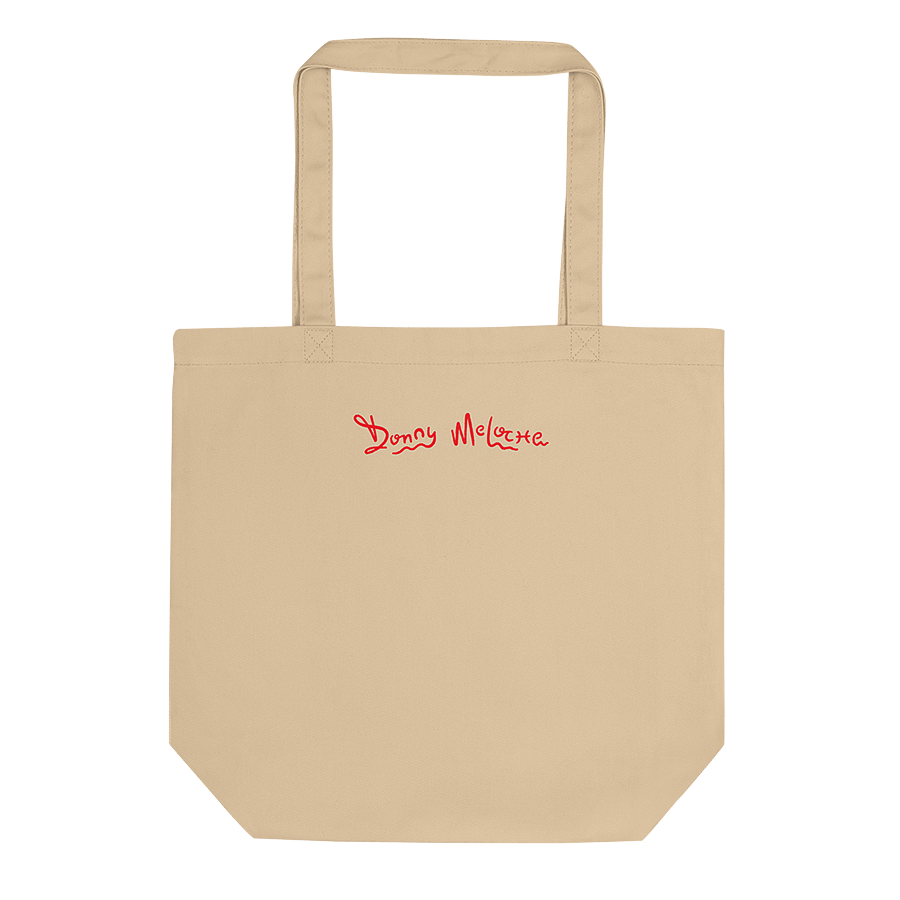 A beige eco tote bag with a playful logo spelling out the name 'Donny Meloche'. © Donny Meloche, 2023.