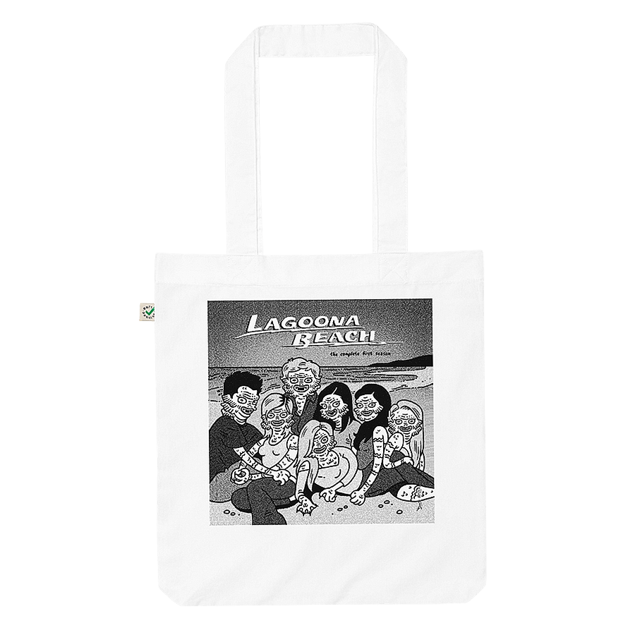 A white tote bag featuring a graphic illustration of 'Lagoona Beach' with creatures from the Black Lagoon sprawled on a sandy beach. © Donny Meloche, 2023.