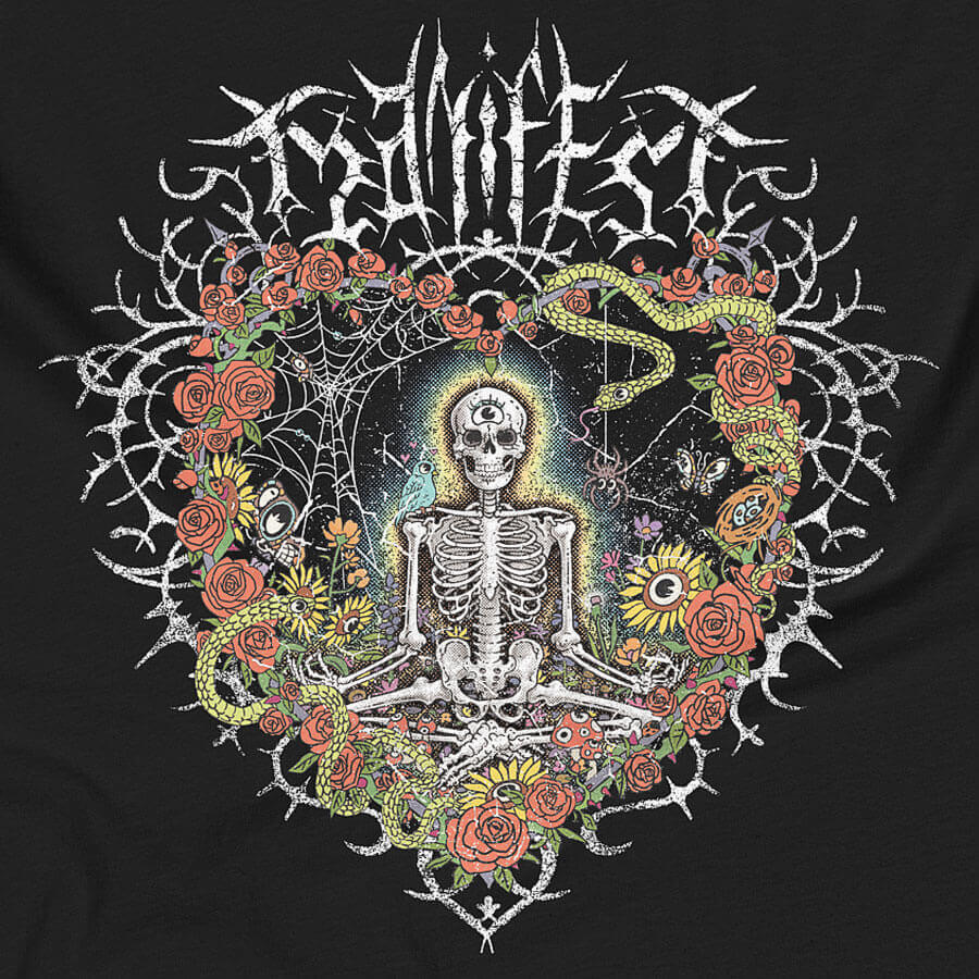 Detail of a black muscle tank top shirt with vibrant digital artwork of a meditating skeleton in a yoga pose amid colorful flowers and insects. A bluebird sits on the skeleton's shoulder. It's framed by a heart-shaped iron fence with snakes, roses, and gothic 'Manifest' text. Expressive eyes and a third eye symbolize spiritual awakening. Despite the edgy look, it carries an uplifting message of manifestation and abundance. © Donny Meloche, 2023.