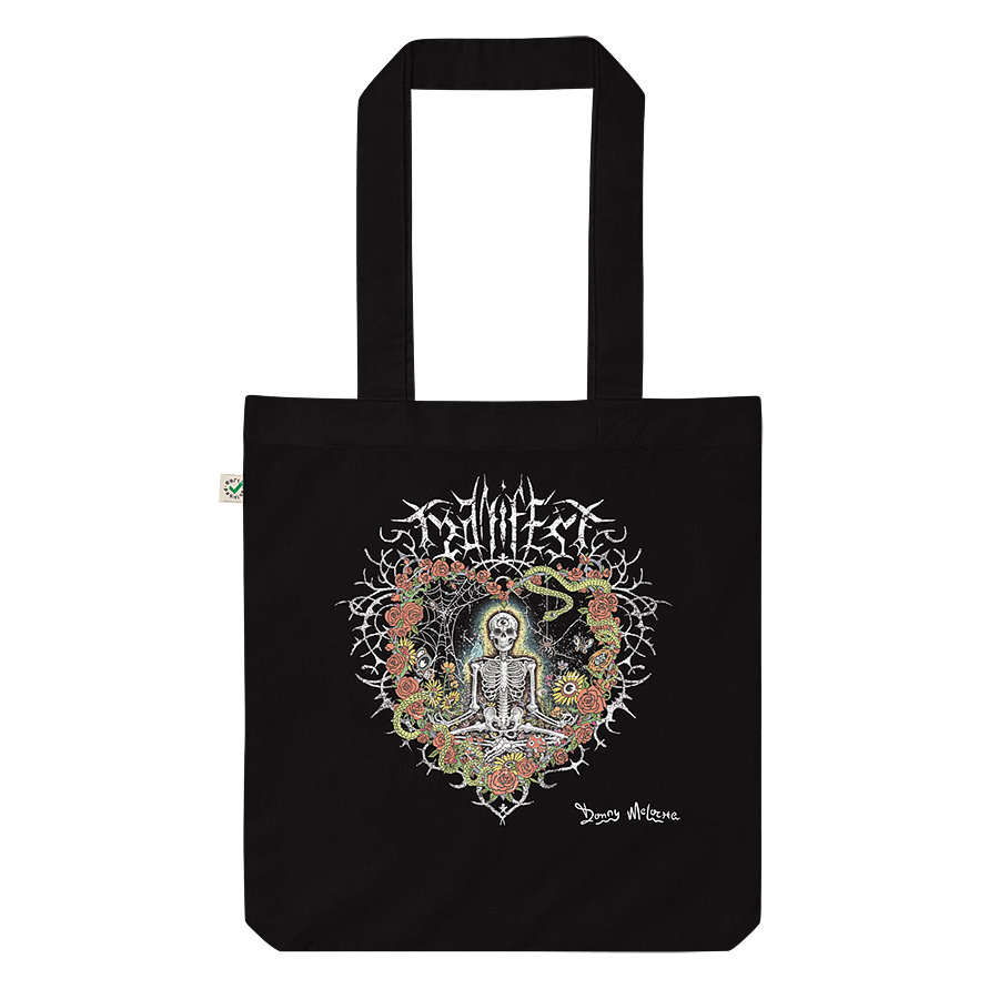 A black organic cotton tote bag featuring a meditating skeleton surrounded by flowers, evoking a vintage metal band tee with a modern, positive twist. Artwork by Donny Meloche, 2023.