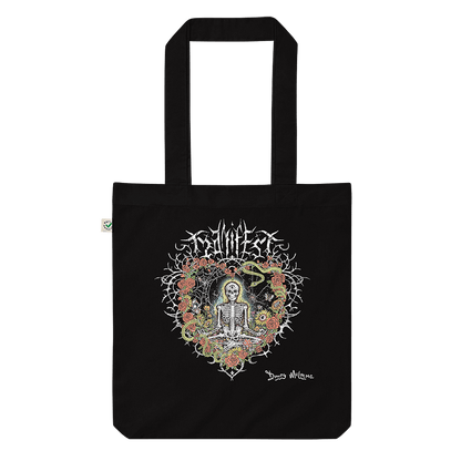 A black organic cotton tote bag featuring a meditating skeleton surrounded by flowers, evoking a vintage metal band tee with a modern, positive twist. Artwork by Donny Meloche, 2023.