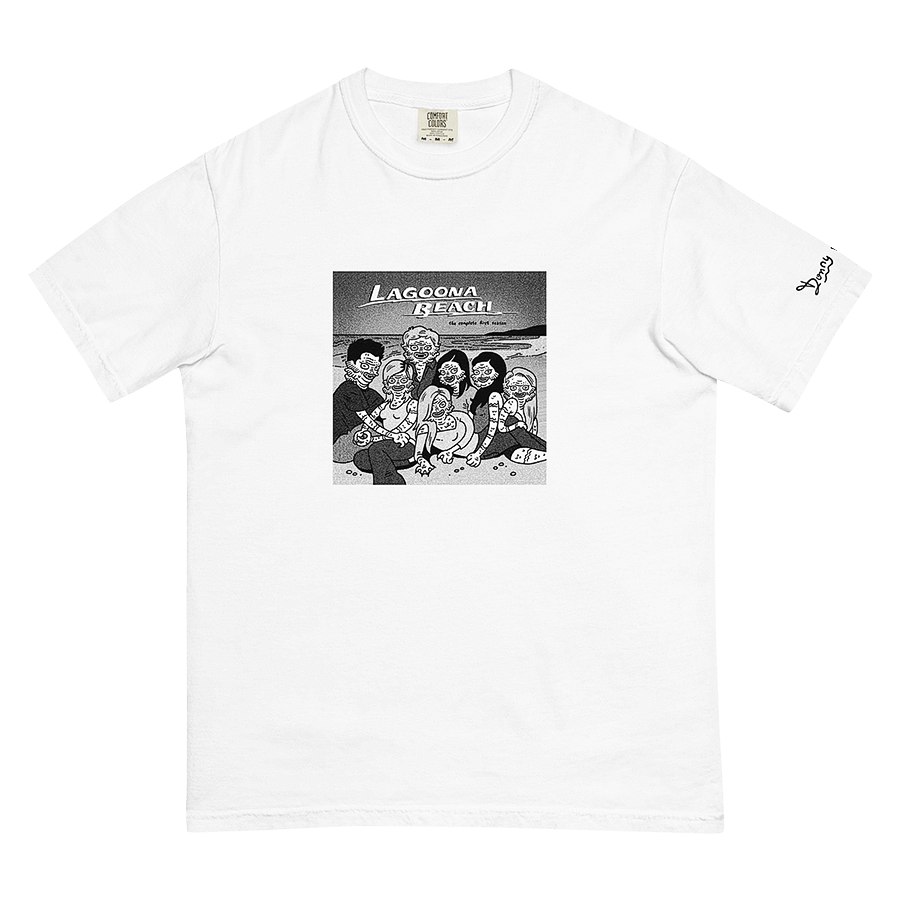 A white t-shirt featuring a captivating graphic illustration of 'Lagoona Beach' with whimsical creatures from the Black Lagoon playfully sprawled on a sandy beach. Donny Meloche's imaginative artwork, © 2023.