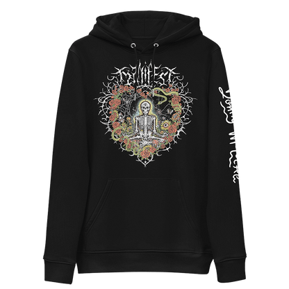 The front of a black hoodie with vibrant digital artwork of a meditating skeleton in a yoga pose amid colorful flowers and insects. A bluebird sits on the skeleton's shoulder. It's framed by a heart-shaped iron fence with snakes, roses, and gothic 'Manifest' text. Expressive eyes and a third eye symbolize spiritual awakening. Despite the edgy look, it carries an uplifting message of manifestation and abundance. © Donny Meloche, 2023.